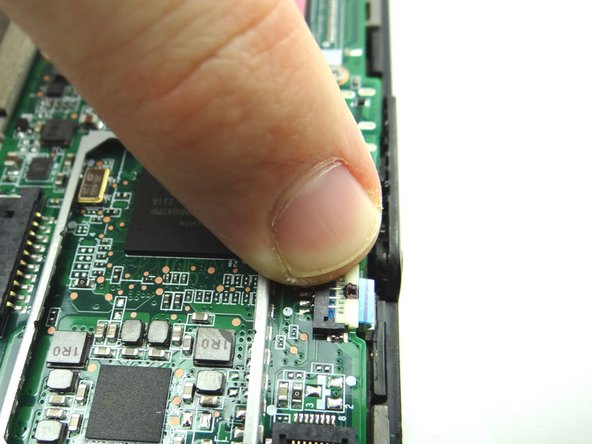 Make sure power button cable is pushed in all the way. Close ZIF connector.