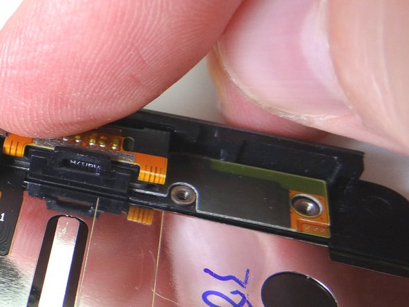 Picture 3.: Push earpiece speaker into place.