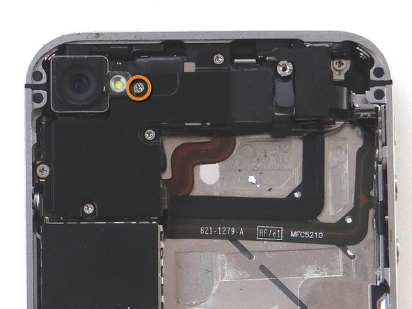 Picture 1: Remove one 2.4 mm Phillips screw.  Place in Sandbox SLOT 3.