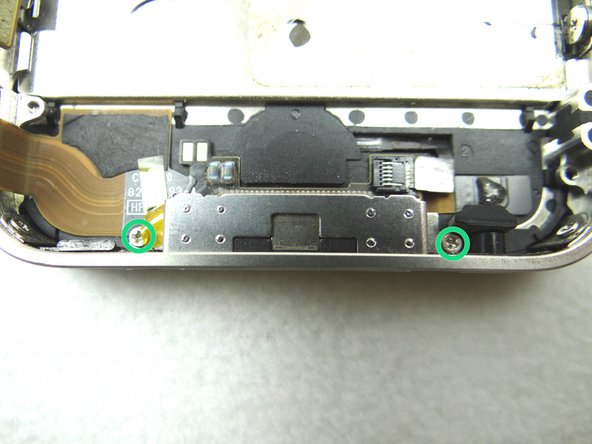 Replace the two 1.3 mm Phillips screws from the charging port in COMPARTMENT F.