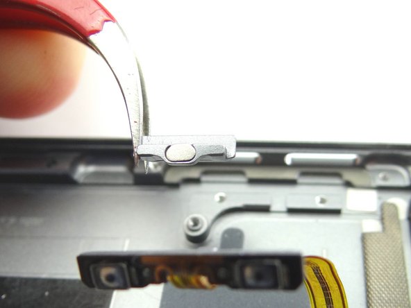 Picture 1: From COMPARTMENT D, replace volume buttons.  Note the orientation when seating.