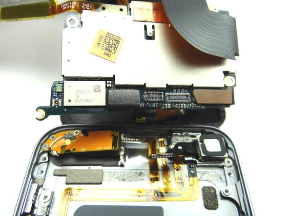 With the three cables disconnected, you can now separate the front panel, logic board, battery and charging port assembly - as one unit - from the rear case.