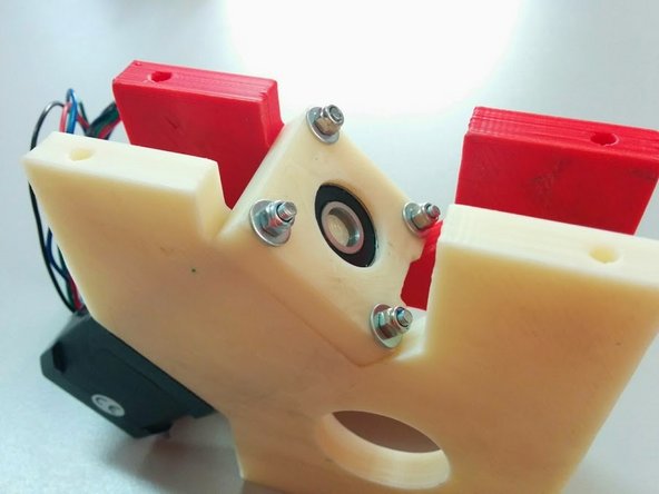 Insert the M3 Washers and screw the M3 nuts on the free end of the threaded rods. Make sure not to tighten them fully. This should be done later.