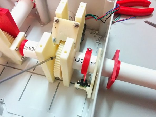 Remove the axis tube, and open a through hole in the marked position on the axis tube.