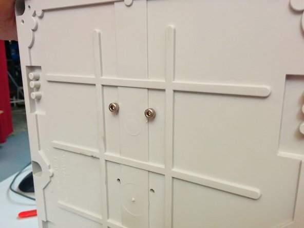 Insert the small axis tube in a gear assembly, then 2 M4 Bolts to temporarily hold the gear assembly to the box. Remember this is simply for marking.