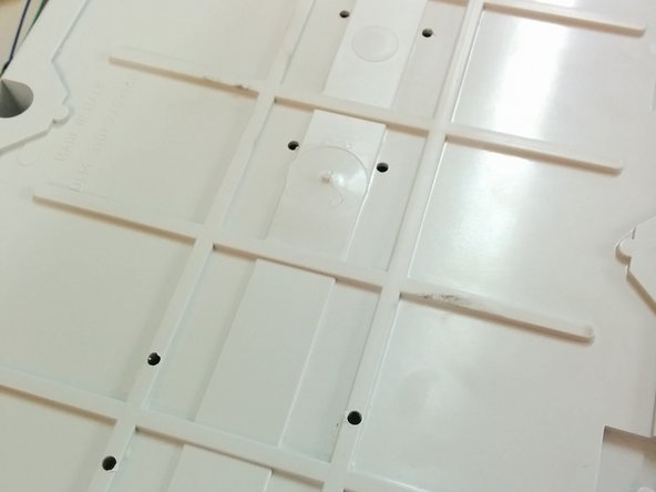 Positioning should be driven by the axis lines. Try to center those axis lines within the box. Keep in mind that the 4 holes of each axis are creating a 60x31mm rectangle.