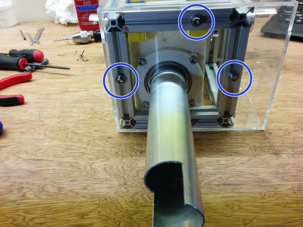 Insert the bottom side of the case and secure it using 4xM4-10 bolts 4xM4 T-slot nuts and 4xM4 washers