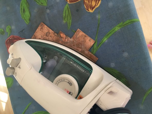 Transfer the image using an electric iron