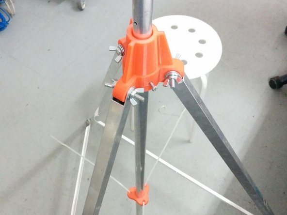 Pass the cable ties through the holes and secure them using single cable connector strips.