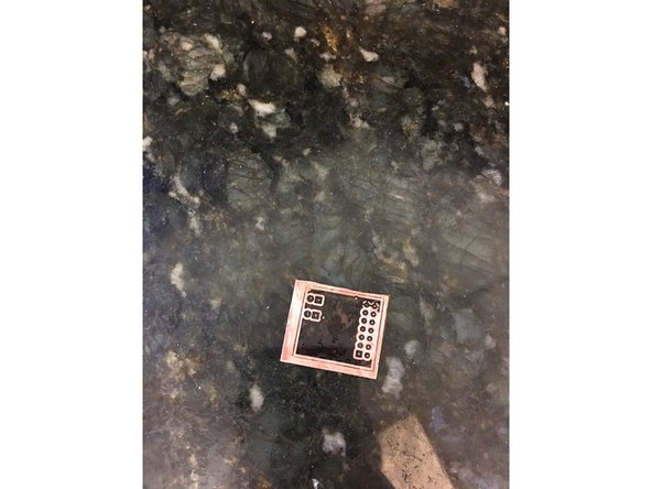 Align the other side of the design with the holes in the copper board.