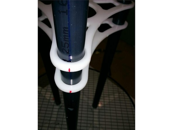 Turn the pipes to align to the marks on the triangular stabillizers