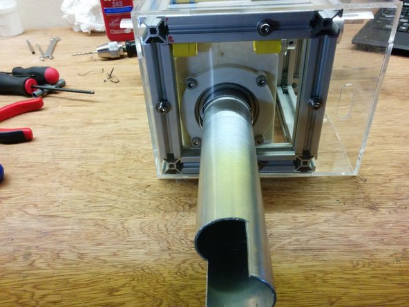 Insert the bottom side of the case and secure it using 4xM4-10 bolts 4xM4 T-slot nuts and 4xM4 washers