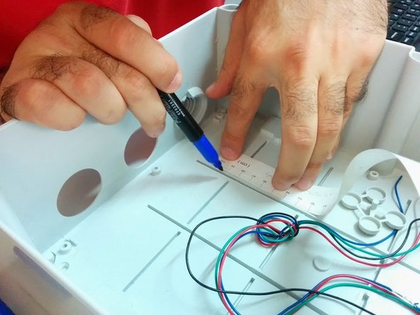 Next step is to mark the holes on the box. For this version we are not using an optimal box, and you should prefer a box without existing holes.