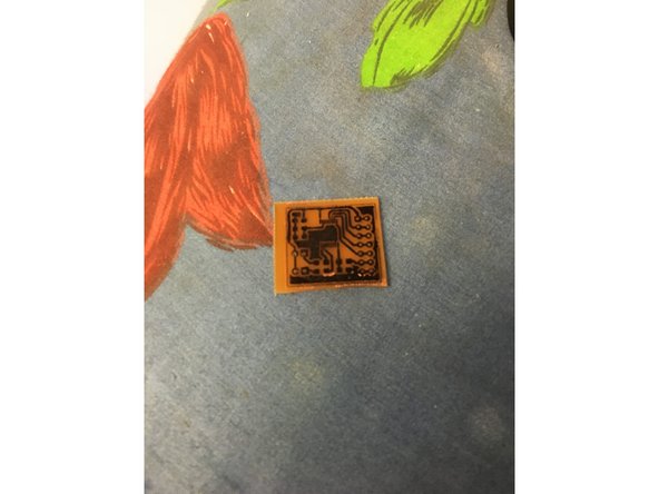 Use pliers to take out the PCB, and check to make sure the entire unmasked area has been etched.