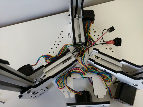 Install (3)TSLOT nuts into the TSLOT. Align them as shown in the image.