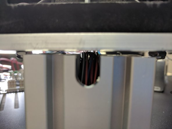 Make sure to look from the outside of the tower towards the center of the upper assembly and ensure that the wires are ALL in their relief.