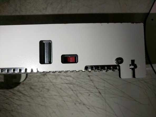 Make sure the 220/110 switch is in the 110 (115) position, as indicated by the arrow.  This defines the input voltage the power supply expects.  If you're in a country where 220v is the standard, make sure the switch is on the 220 setting.  Assemble with four M4 x 16 screws and M4 washers (In base electronics hardware pack - 84493).