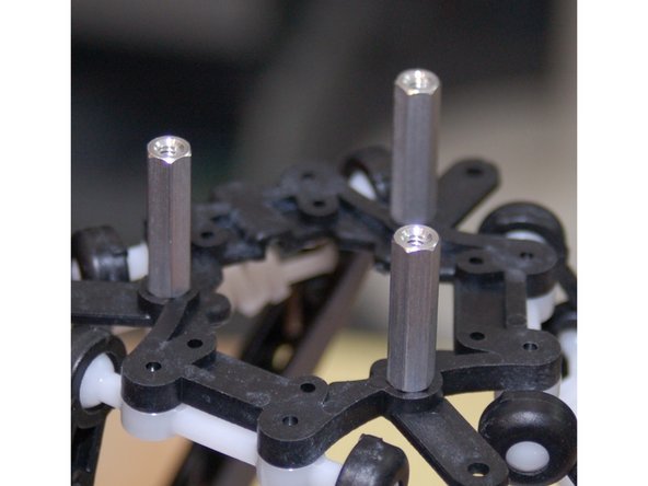 Using the #6-32 3/8&quot; pan head screws you got, install the 1&quot; F-F hex spacers on to the effector platform as shown.