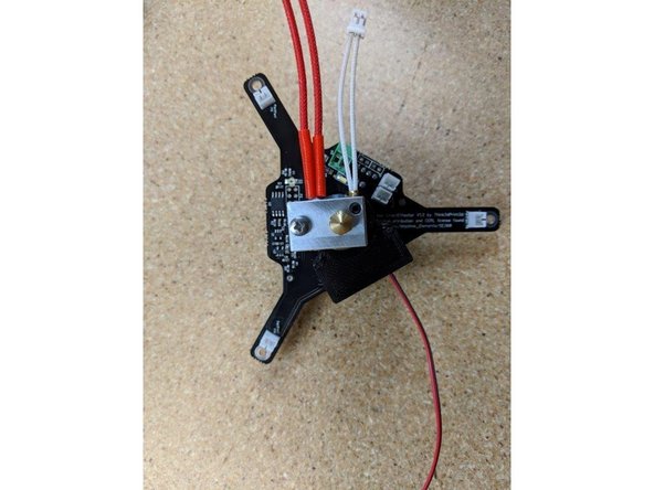 Plug the fan into the white connector labeled HeatFan (P7) as shown in Pic 2