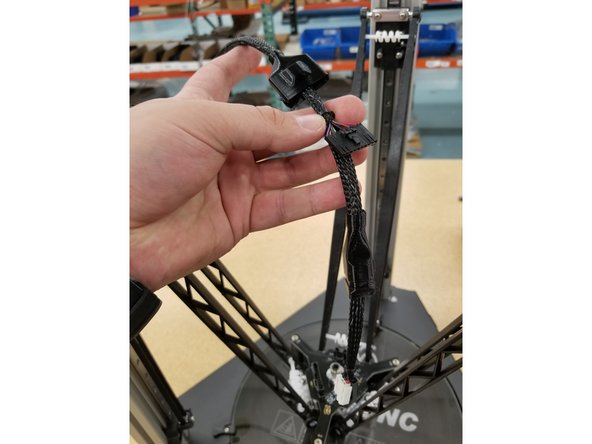 Pull back the cable boots to give access to the connectors at the end of the whip.