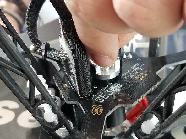 Unscrew the knurled PTC assembly from the top of the hotend