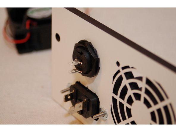 When installing the power switch, ensure it's in the &quot;off&quot; position by setting the switch so that the &quot;low&quot; point of the rocker is closest to the terminal near the edge of the switch.