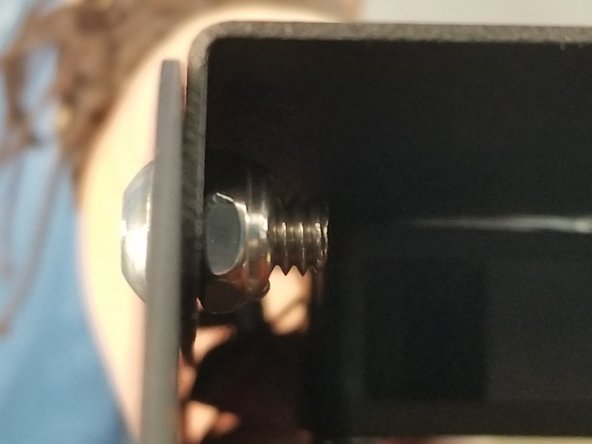 On the remaining 5 locations of the base, secure the sheet metal cover to the base plate with the 5 1/4-20 1/2&quot; long button cap screws and nylon insert nuts.