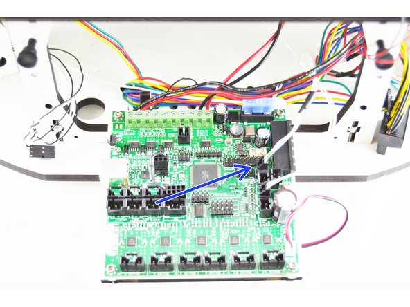 Plug the 2 pin latching housing with the blue wire into the PS-ON location on the RAMBo board. (shown in the image with an orange arrow)