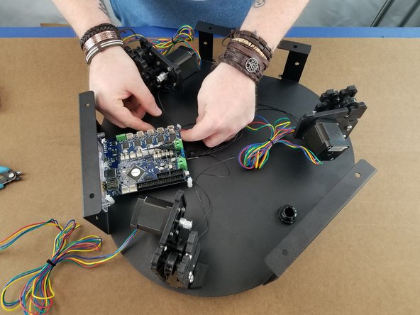Here we will plug in the X motor.  This is the motor on the bracket on the opposite side of the Duet board.