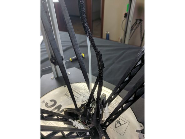 Bunch the mesh loom up approximately 100mm from the top of the extruder and insert the Bowden Tube.