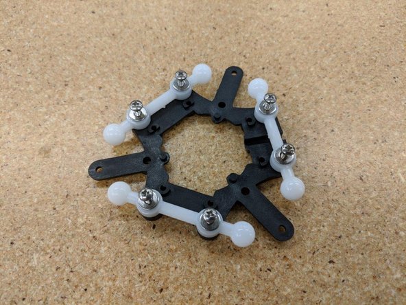 Fix each ball arm into place using two #4, 3/8&quot; screws and two washers.