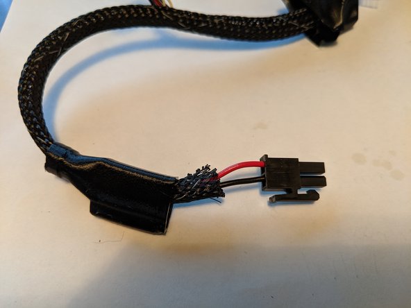 There are tabs on each side of the metal plugs and they are inserted with the tabs facing the long flat side of the black connector.  This is how the wires are being held in Pic 1 and how they will insert into the black housing.