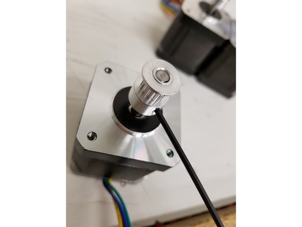 Next Step is installing the new 16tooth Timing Pulleys. Use the photo on the left as a reference on where to tighten down the pulley to the stepper shaft. Use a 2mm Allen Wrench to tighten the set screws. MAKE SURE TO TIGHTEN THE SET SCREW ON THE FLAT OF THE STEPPER SHAFT FIRST.