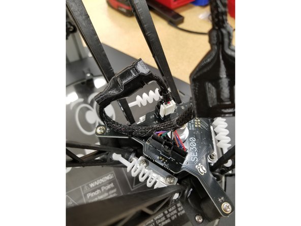 Plug in the 4 pin SL connector and the 2 pin phoenix connector to their homes on the hotend board.