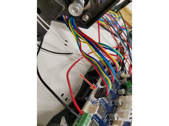 Plug in the extruder motor the same way you did with the motors, in the next available position on the Duet.