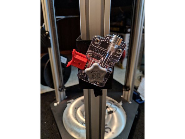 Put another locking clip on the PTFE tube, and insert the tube into the extruder.