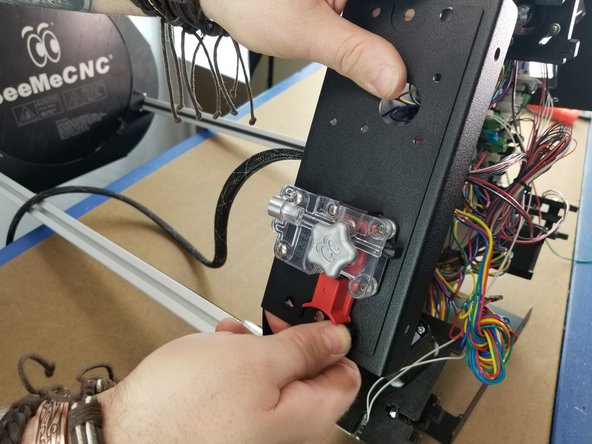 Make sure the extruder is orientated in the proper way.  The PTC connector on the extruder should face the bottom of the machine and the red lever will be on the right when facing the extruder.