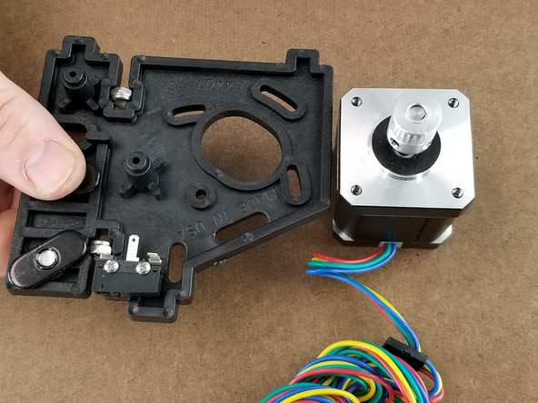 This step will use a large bracket and motor with pulley installed on it as shown in Pic 1.