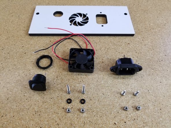 Install the rocker switch and IEC Plug on the plate shown, in the orientation shown.
