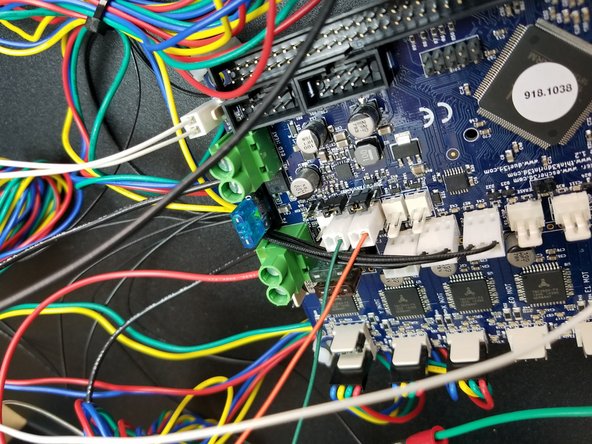 This is the row of 2 pin connectors just above the endstop connectors behind the large green connector with the red and black wires going to it.