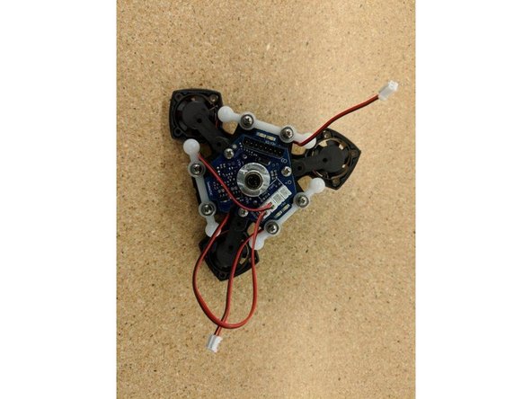 Route the fan leads as shown and plug into the JST connectors at the top of the PCB.