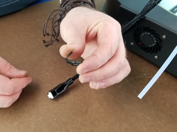 Bend the lanyards in half as shown in Pic 2 and squeeze it to put a bend in it.