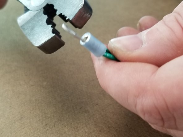 Twist the 3 ends together to combine the wires.  Place the blue crimp over the ends of the combined wires as shown in Pic 3.