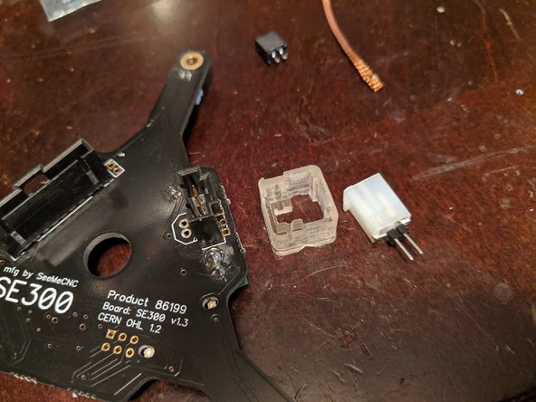 Get the support ring and the new power plug from the Retro Fit Kit (your ring may appear different or different color).