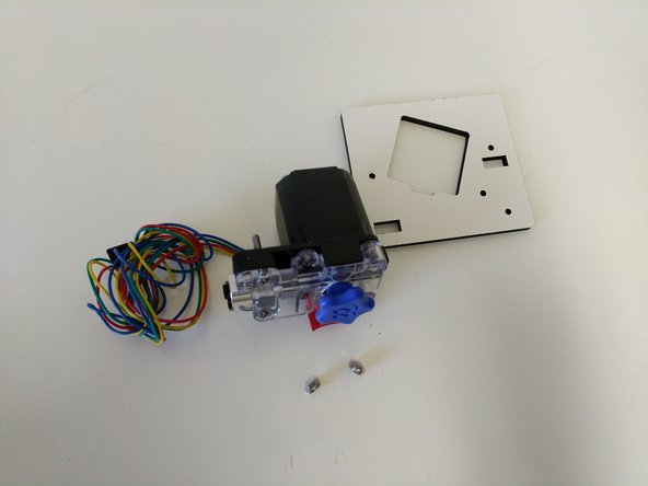 Mount the EZRStruder to the EZR Struder plate as shown in the images. (The 6-32 x 1&quot; screws were put in the EZR Struder's mounting holes for safe keeping when you built it)