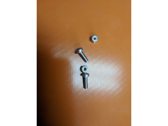You will secure the IEC Connector to the sheet metal with M3 x 10mm screws and nylon lock nuts.
