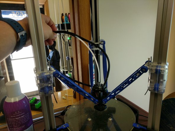 The PTFE will enter the mesh loom approximately 90mm beyond the extruder. Open a gap in the mesh by pressing two areas about 1&quot; apart toward each other. This will expand the loom.