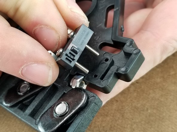 Line the screws up to the holes on the large bracket as shown in Pic 2.