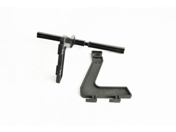 Assemble the spool holder as shown in the attached images.