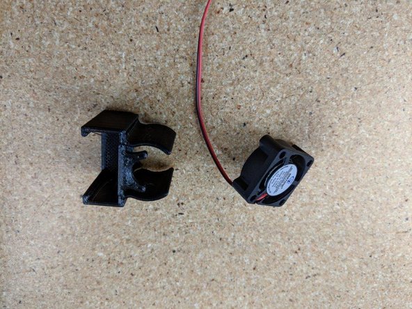 Locate the 25mm fan and fan shroud